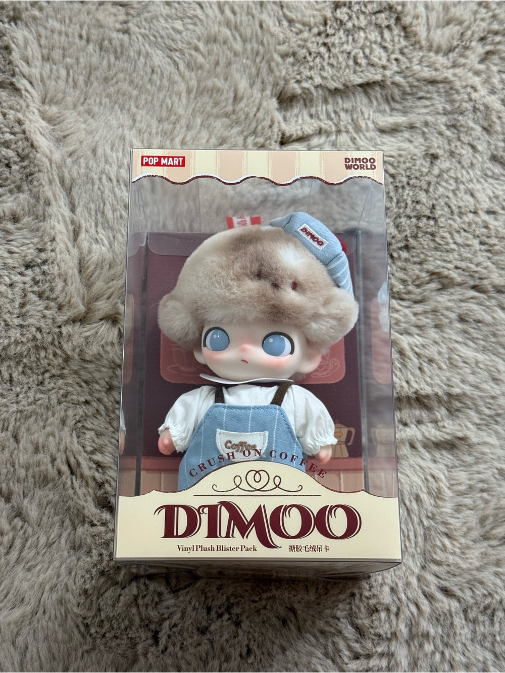 DIMOO Plush Vinyl Figure in Light Blue Outfit with Beige Fur Hat